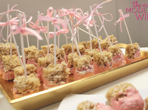 These pink chocolate covered rice krispy treats are perfect for a pink baby shower for a girl!