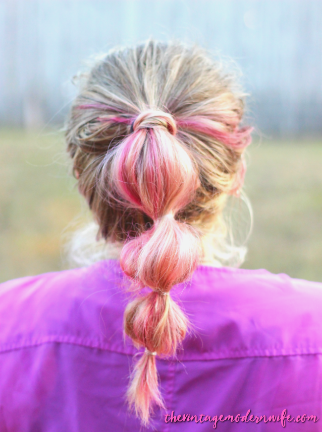 This bubble ponytail tutorial by The Vintage Modern Wife is TOO cute and super easy! She breaks it down into a few easy steps that helped me take my hair from drab to fab in 5 minutes! Plus, I love her pink and blonde hair! Check it out for #momhairmonday!
