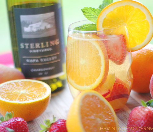 This Sparkling White Wine Summer Sangria combines Sterling Vineyards Napa Valley Chardonnay with all things summer! It's the absolute most perfect drink and will surely be love at first sip!